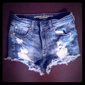 Distressed short denim shorts